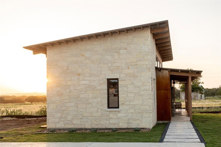 Exterior details and patio area of a home in , Hye (Image 14).