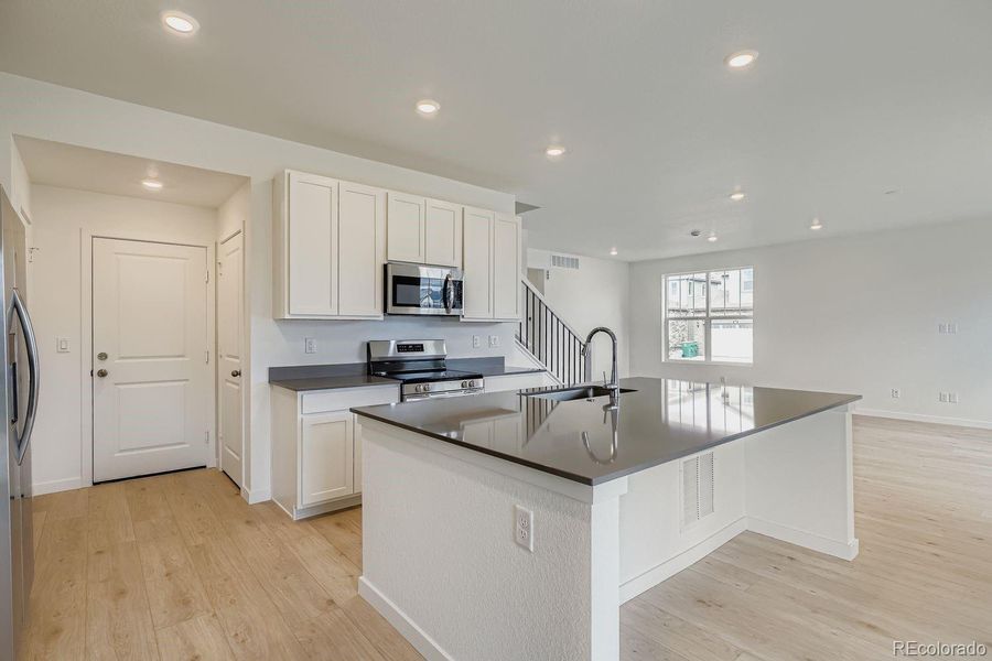 Furnished interior view inside a new home in Sky Ranch: Pioneer Collection, Watkins (Image 8).