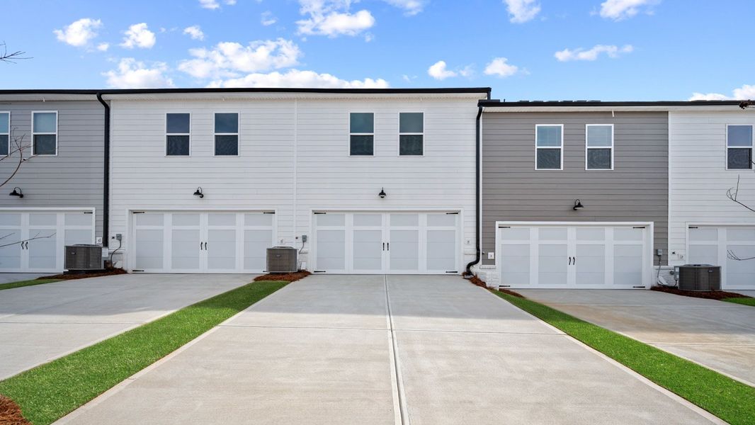Front exterior of a new home in Echo Glen, Stockbridge, GA, highlighting curb appeal (Image 20).