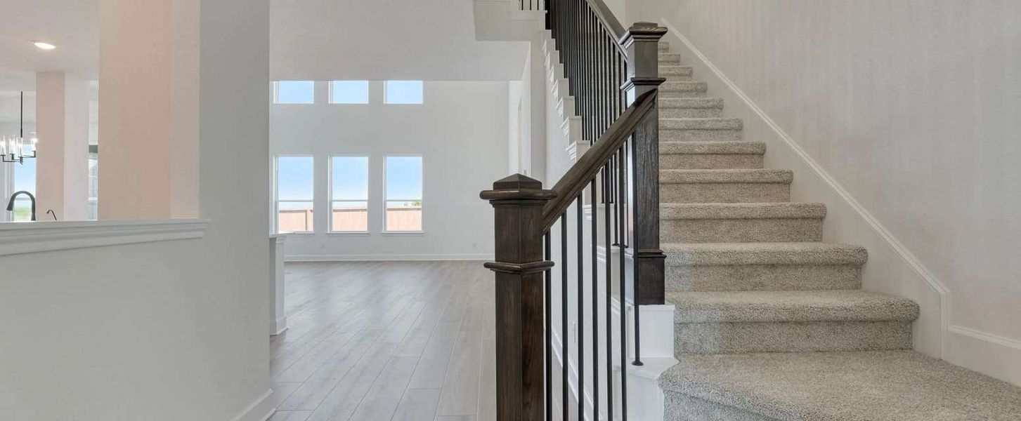 Representative unfurnished interior of a home built from the Barnett by Ashton Woods in Megan's Landing, Castroville (Image 25). Representative unfurnished interior of a home built from the Barnett by Ashton Woods in Megan's Landing, Castroville (Image 25).