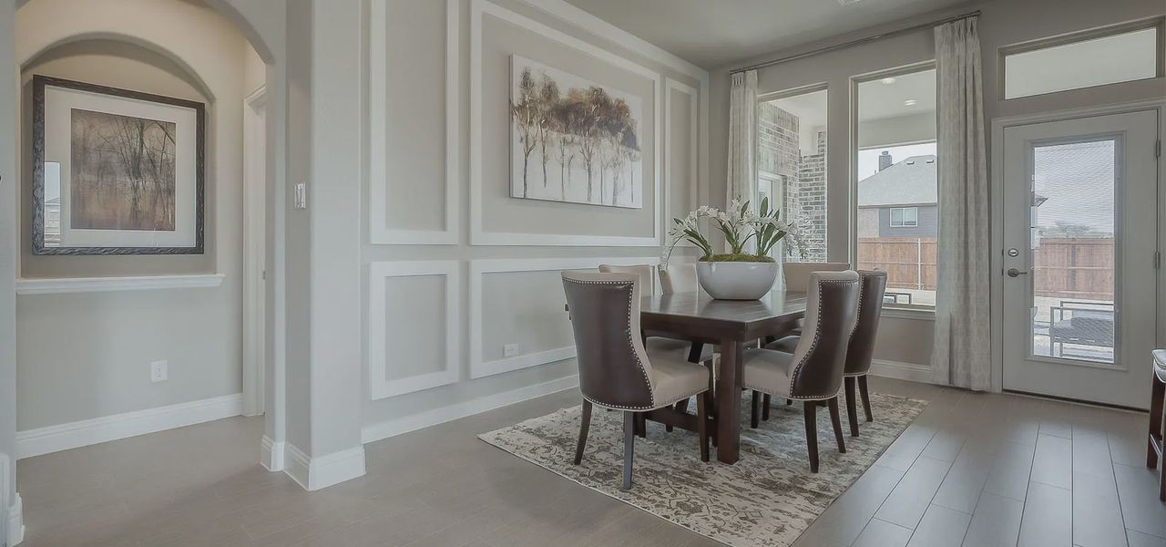 Representative furnished interior of a home built from the San Angelo by Chesmar Homes in Heartland 50's & 60's, Heartland (Image 3).