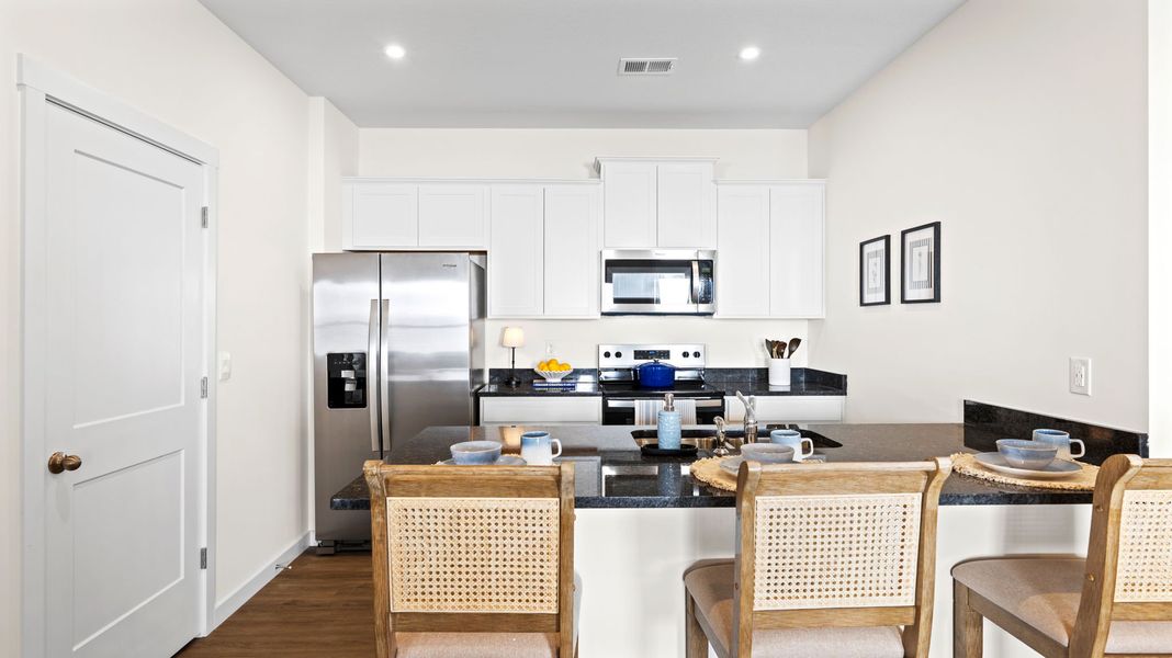 Representative furnished interior of a home built from the Bayshore by D.R. Horton in Cambridge Cove, Chickamauga (Image 13).