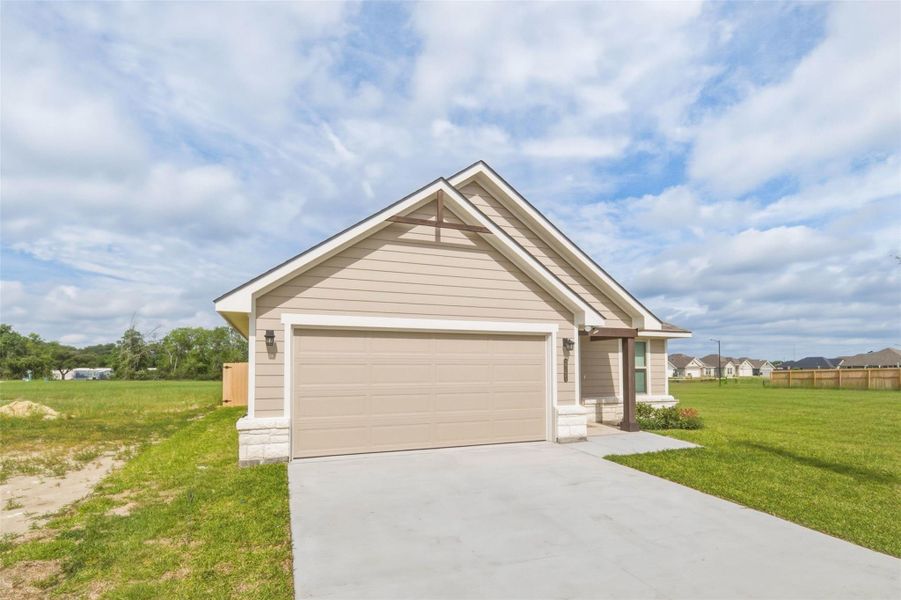 Front exterior of a new home in , Bryan, TX, highlighting curb appeal (Image 18). Front exterior of a new home in , Bryan, TX, highlighting curb appeal (Image 18).