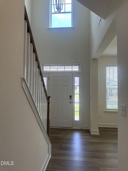 Hallway to Front door and Office or form
