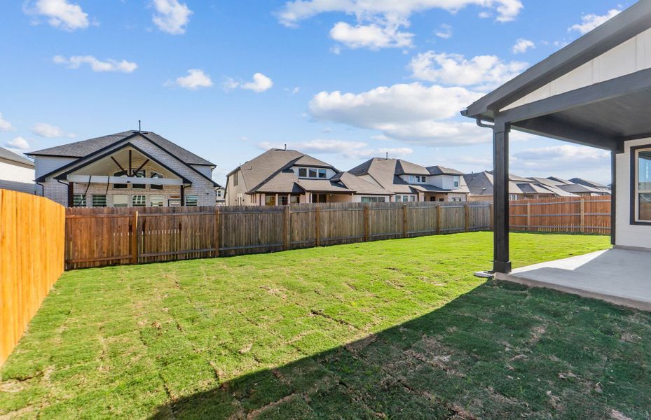 Exterior details and patio area of a home in Santa Rita Ranch, Liberty Hill (Image 4).