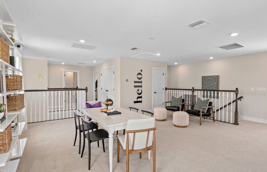 Representative furnished interior of a home built from the Coral Grand by Pulte Homes in Avera, Orlando (Image 10).