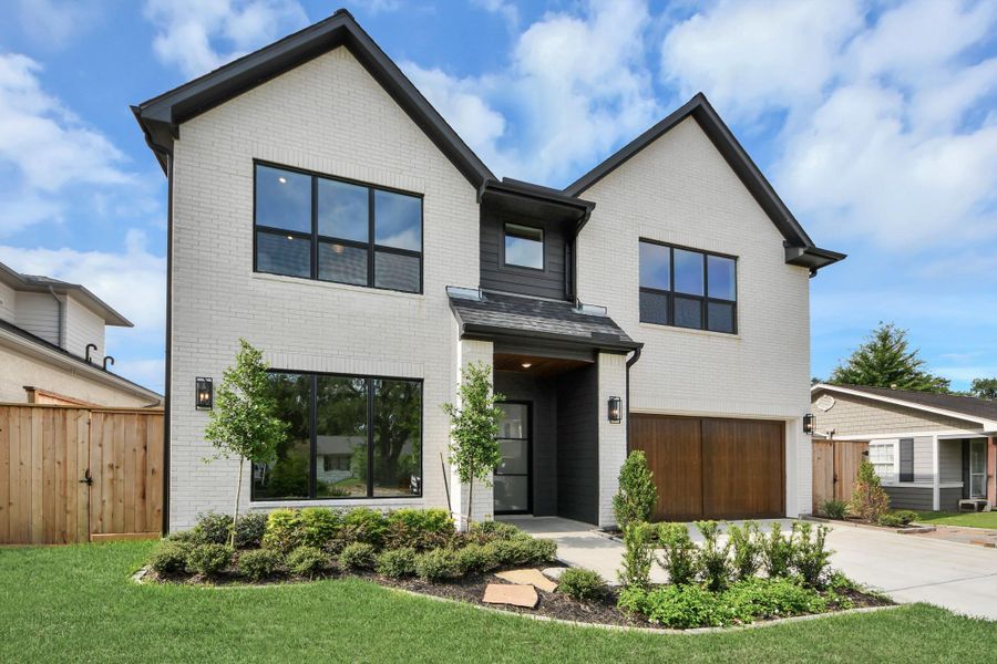 Front exterior of a new home in , Houston, TX, highlighting curb appeal (Image 24).