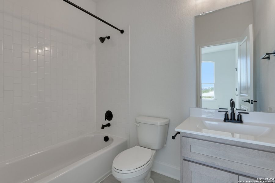 Furnished interior view inside a new home in Megan's Landing 70's, Castroville (Image 11).