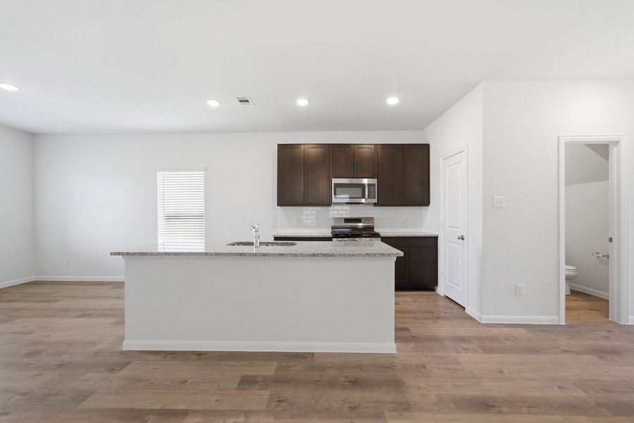 Furnished interior view inside a new home in Windrose Green, Angleton (Image 7).