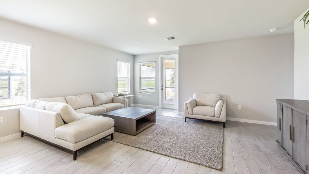 Furnished interior view inside a new home in Palmetto Landing at Babcock Ranch - Express, Punta Gorda (Image 3). Furnished interior view inside a new home in Palmetto Landing at Babcock Ranch - Express, Punta Gorda (Image 3).