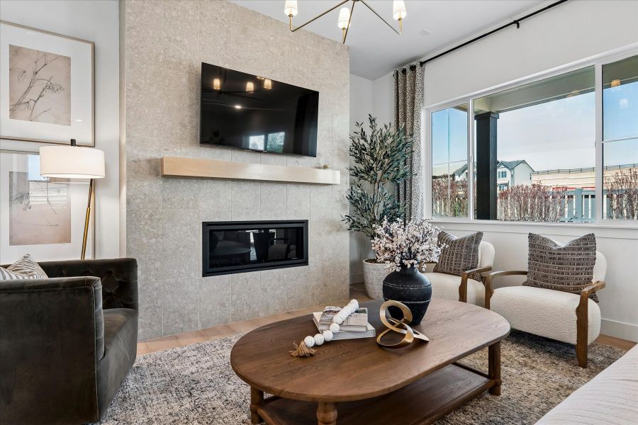 A living room with a fireplace.