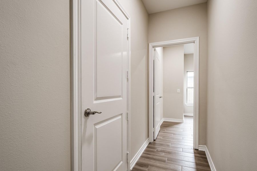Clean, bright hallway leading to bedrooms. Clean, bright hallway leading to bedrooms.