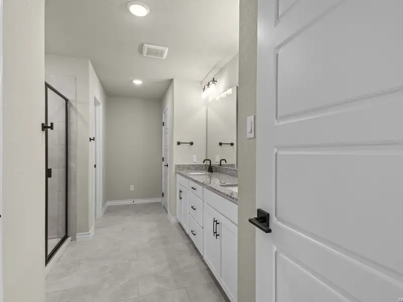 Furnished interior view inside a new home in The Reserve at Potranco Oaks, Castroville (Image 15).