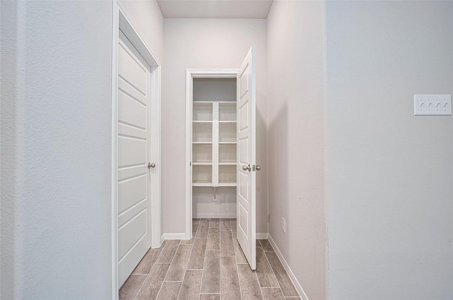 Spacious, unfurnished interior of a new home in Sunterra, Katy (Image 26).