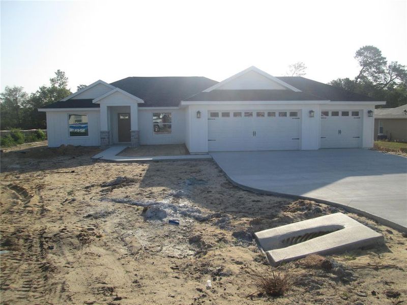 Front exterior of a new home in , Ocala, FL, highlighting curb appeal (Image 40).