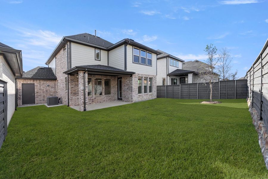 Exterior details and patio area of a home in Union Park, Little Elm (Image 3).