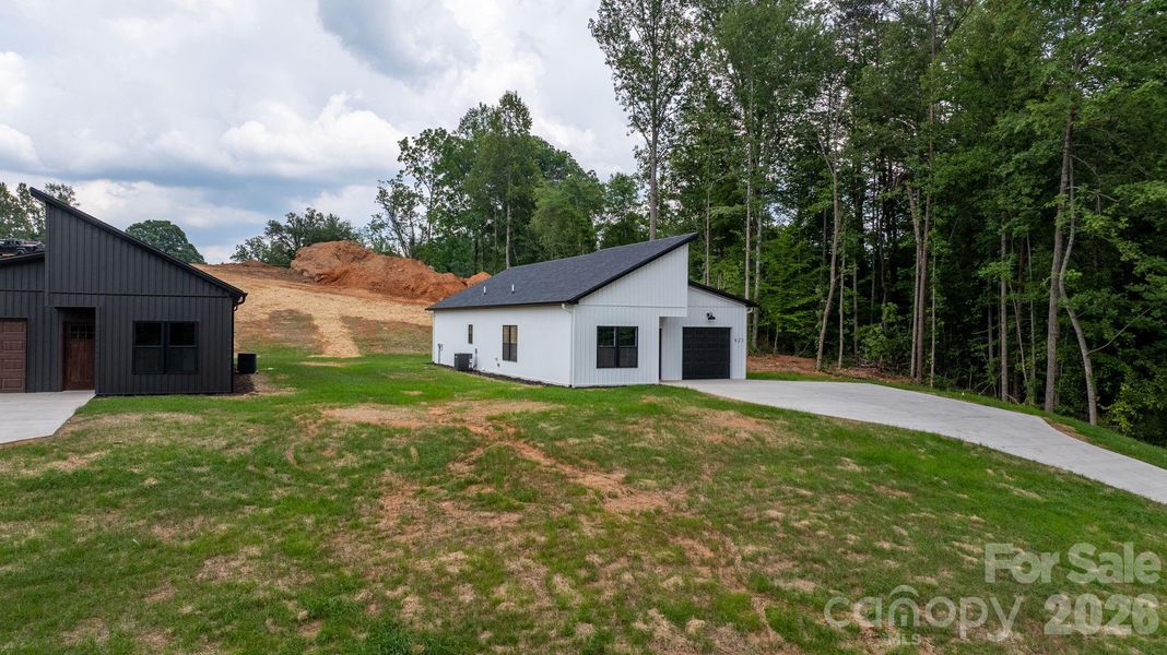 Front exterior of a new home in , Lenoir, NC, highlighting curb appeal (Image 20). Front exterior of a new home in , Lenoir, NC, highlighting curb appeal (Image 20).