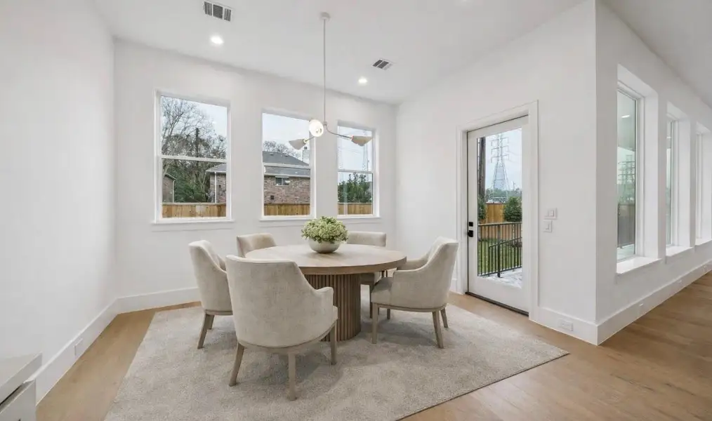 Virtually staged eating area in the breakfast nook