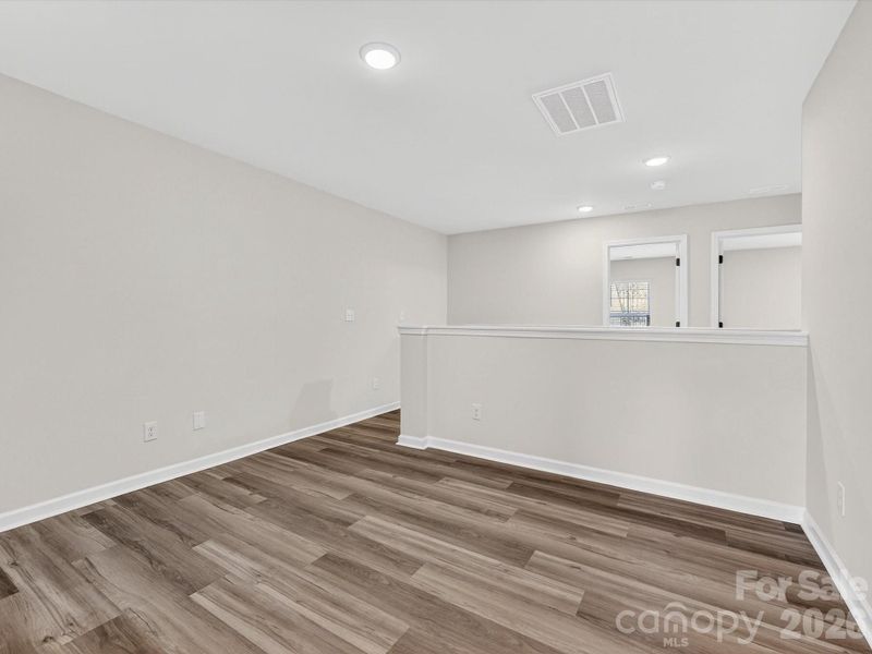 Spacious, unfurnished interior of a new home in North Creek Village, Huntersville (Image 16).