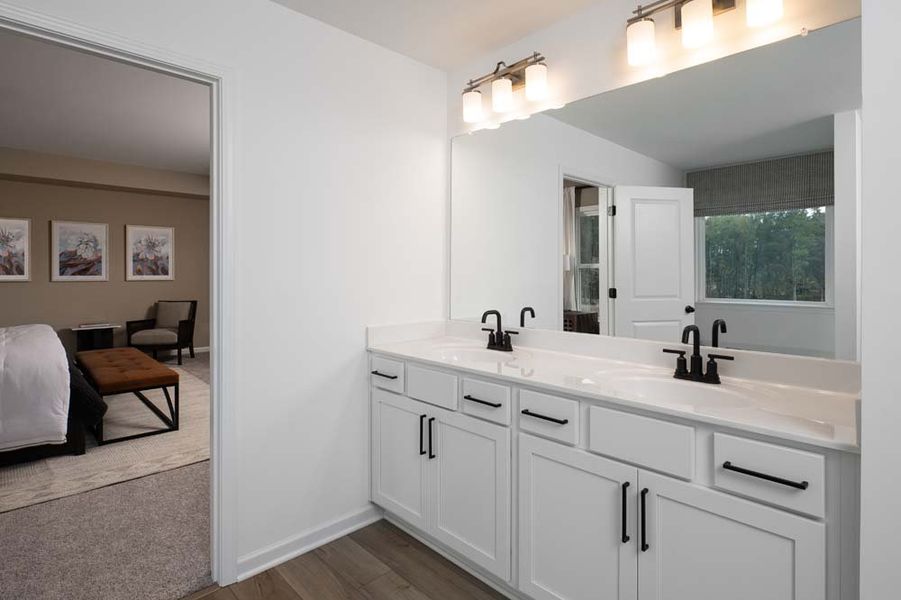 Representative furnished interior of a home built from the Hampstead by Ashton Woods in The Pointe at Heron Bay, Locust Grove (Image 8). Representative furnished interior of a home built from the Hampstead by Ashton Woods in The Pointe at Heron Bay, Locust Grove (Image 8).