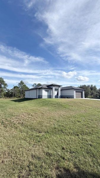 Exterior details and patio area of a home in , Lehigh Acres (Image 30). Exterior details and patio area of a home in , Lehigh Acres (Image 30).