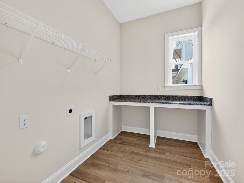 Spacious, unfurnished interior of a new home in North Creek Village, Huntersville (Image 31).