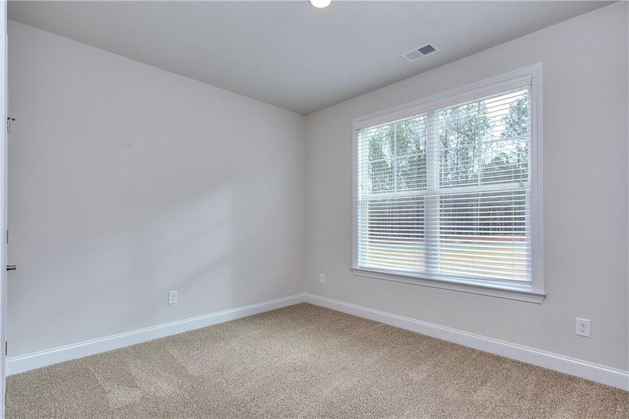 Spacious, unfurnished interior of a new home in Waters Edge, Mansfield (Image 11).