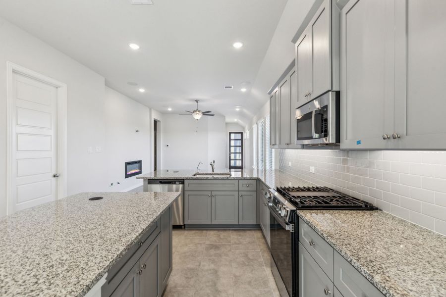 Representative furnished interior of a home built from the Tucson by Chesmar Homes in Avondale, Fate (Image 5).