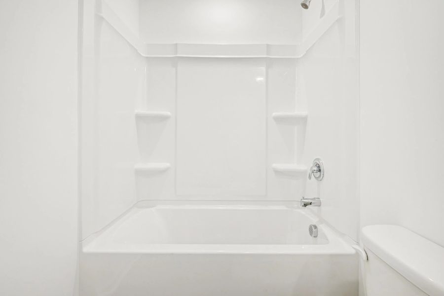 Bath 2 - Stylish finishes and dramatic contrast throughout.