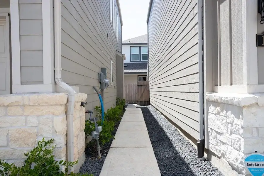 Exterior details and patio area of a home in , Houston (Image 3). Exterior details and patio area of a home in , Houston (Image 3).