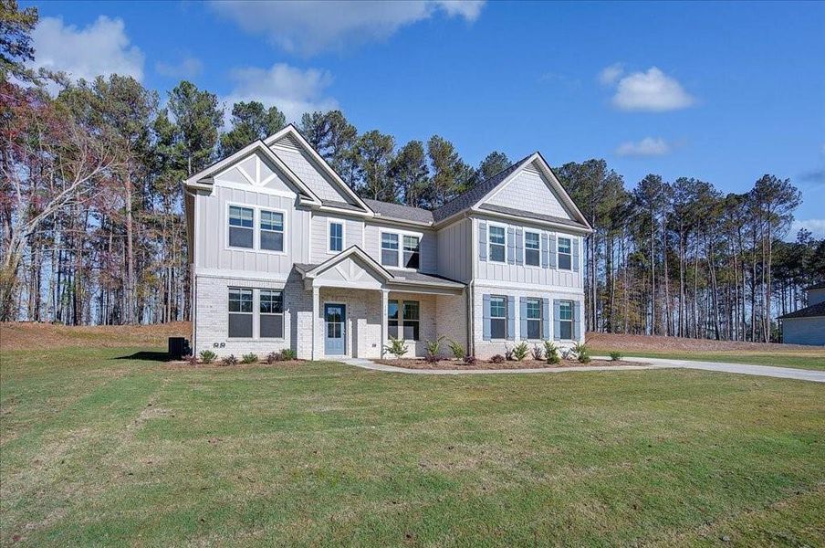 Front exterior of a new home in Riverbend Overlook, Fayetteville, GA, highlighting curb appeal (Image 17).