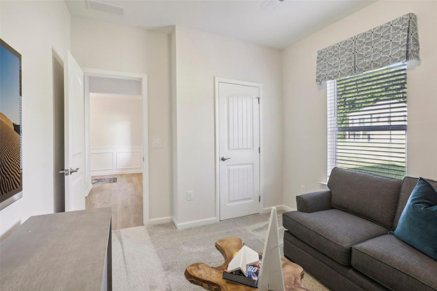 The Avondale- Bedroom 2. Sample image for illustration; upgrades, options, and colors may vary.