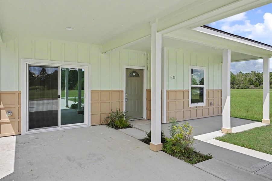 Exterior details and patio area of a home in , Trinity (Image 3). Exterior details and patio area of a home in , Trinity (Image 3).