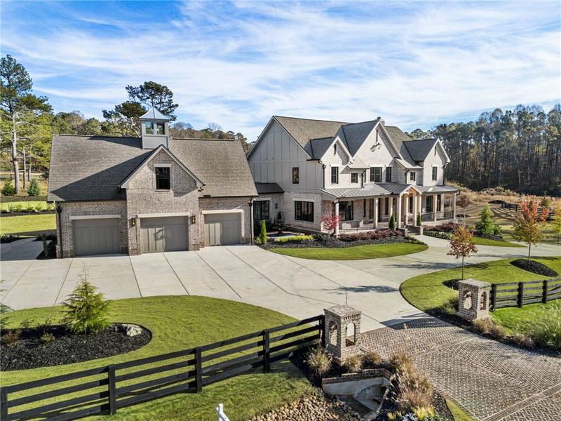 Front exterior of a new home in , Alpharetta, GA, highlighting curb appeal (Image 1).