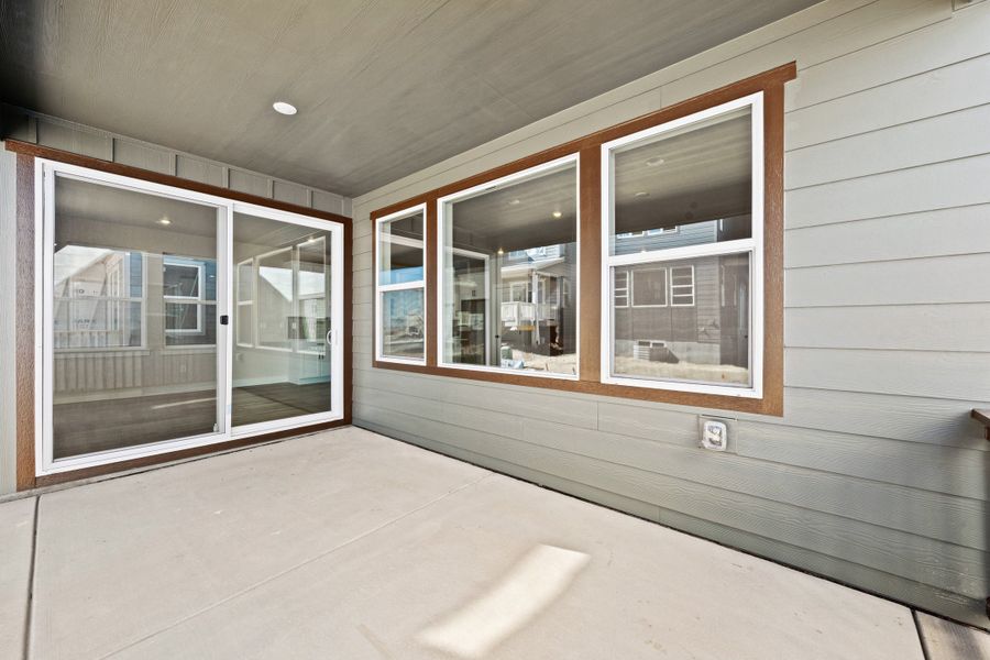 Exterior details and patio area of a home in Trumark Homes at Sterling Ranch, Littleton (Image 2).