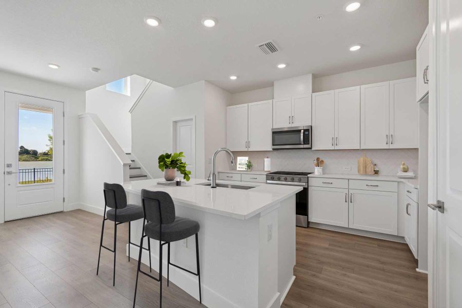 Representative furnished interior of a home built from the The Waterway by David Weekley Homes in Persimmon Place - Townhomes, Wesley Chapel (Image 7).