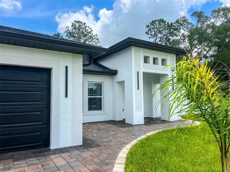 Exterior details and patio area of a home in , North Port (Image 27).