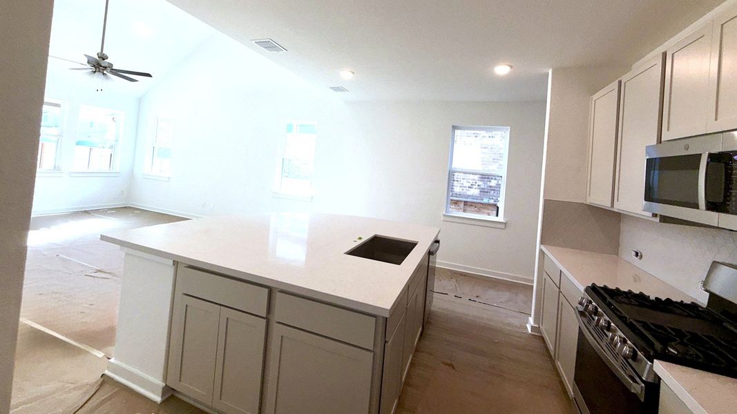 Furnished interior view inside a new home in Flora, Hutto (Image 9).