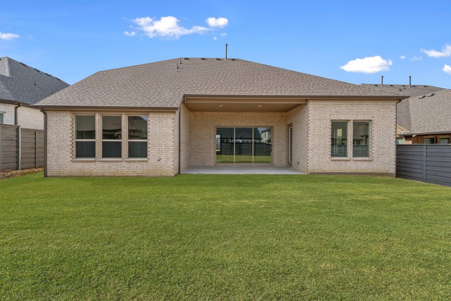 Exterior details and patio area of a home in Union Park, Little Elm (Image 4). Exterior details and patio area of a home in Union Park, Little Elm (Image 4).