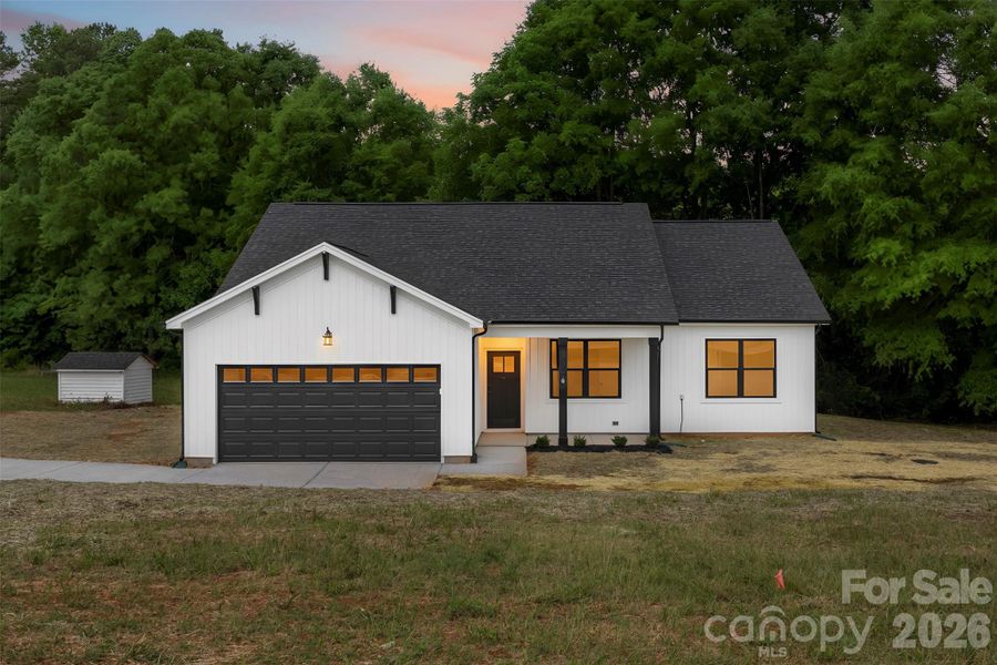 Front exterior of a new home in , Salisbury, NC, highlighting curb appeal (Image 24).