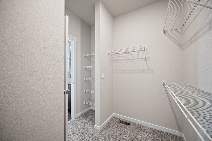 Spacious, unfurnished interior of a new home in Ridge at Lorson Ranch, Colorado Springs (Image 29).