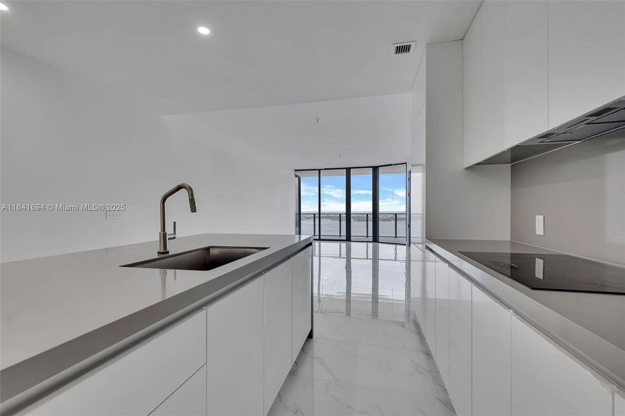 Furnished interior view inside a new home in Aria Reserve, Miami (Image 6).