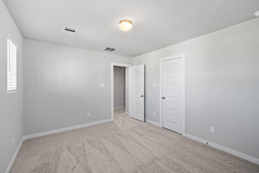 Spacious, unfurnished interior of a new home in Grand Oaks Village, Houston (Image 29).