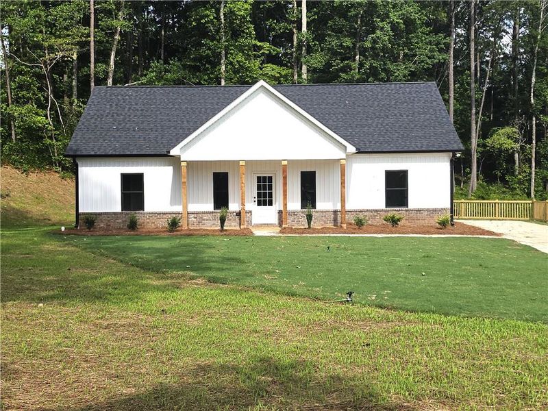 Front exterior of a new home in , Dallas, GA, highlighting curb appeal (Image 1). Front exterior of a new home in , Dallas, GA, highlighting curb appeal (Image 1).