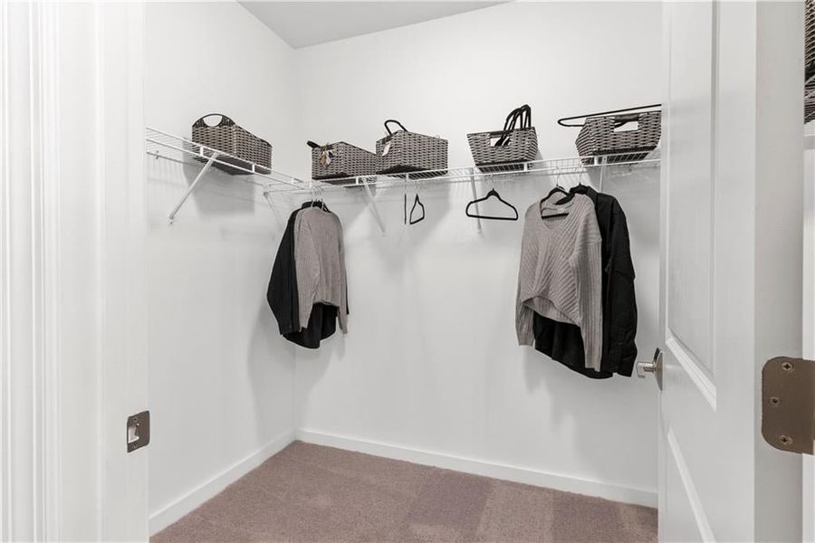 Large walk in closet *Images from the model, not the subject property*