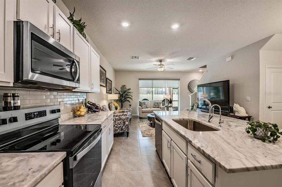 Furnished interior view inside a new home in Azalea Shores, Largo (Image 29).
