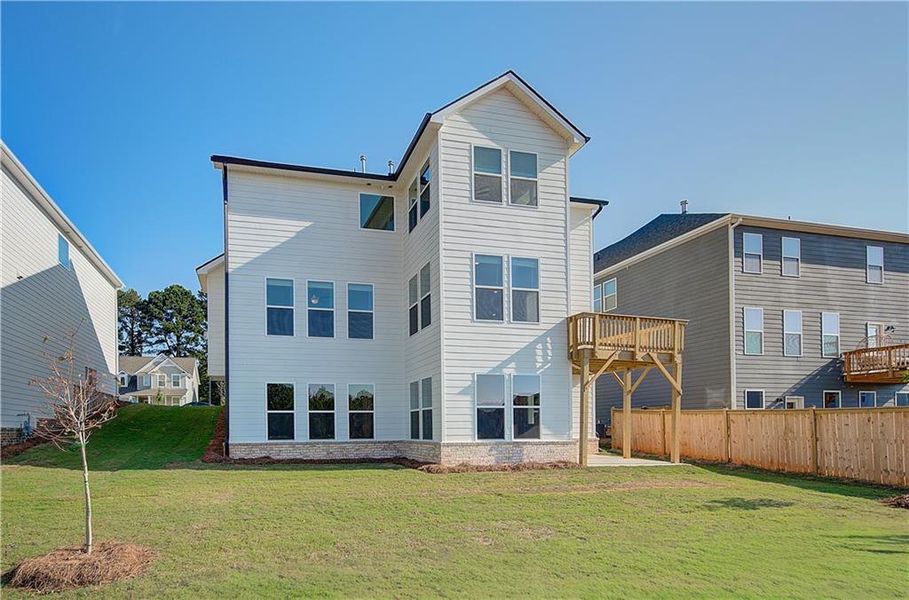 Front exterior of a new home in Cooper Park, McDonough, GA, highlighting curb appeal (Image 1).