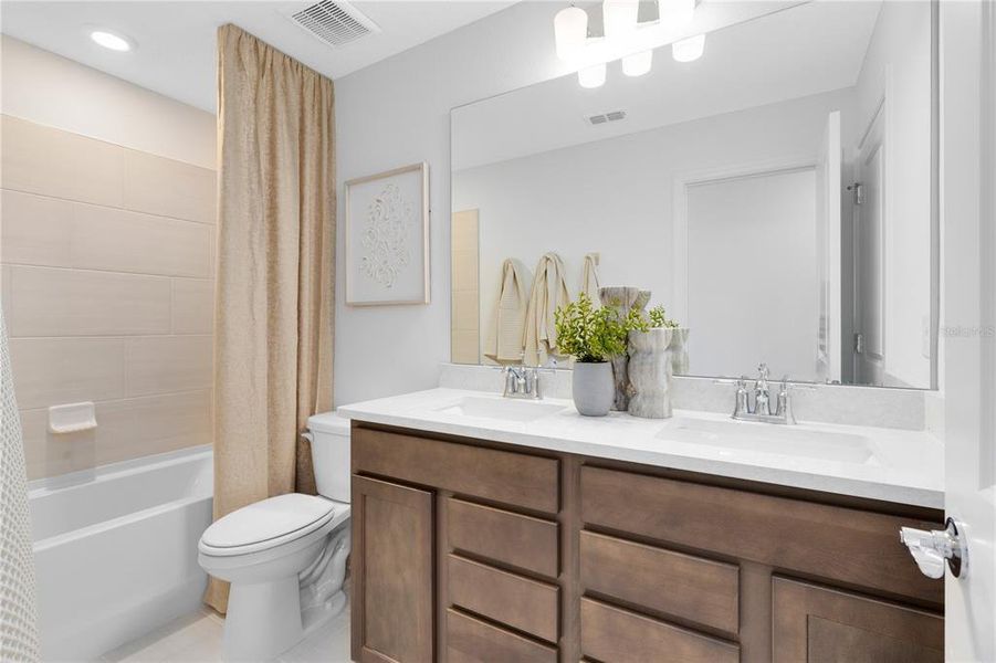 Furnished interior view inside a new home in EverBe, Orlando (Image 23).