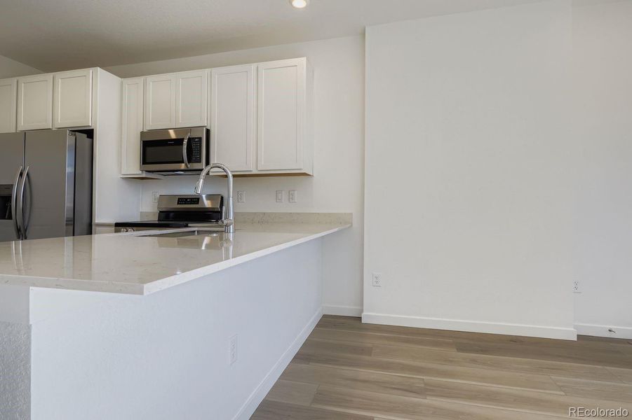Furnished interior view inside a new home in Parterre: The Parkside Collection, Thornton (Image 5).