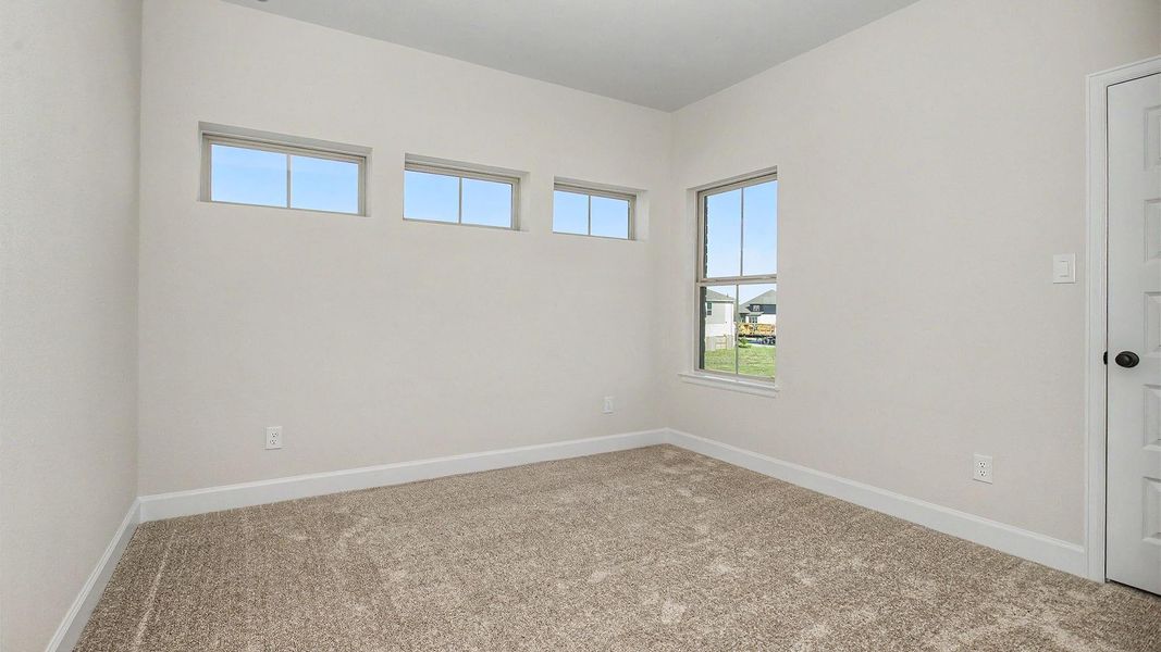 Spacious, unfurnished interior of a new home in Meridiana, Manvel (Image 6).